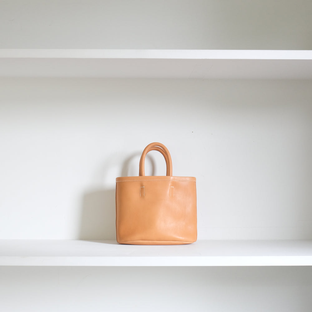 Leather oval basket bag mini Beige