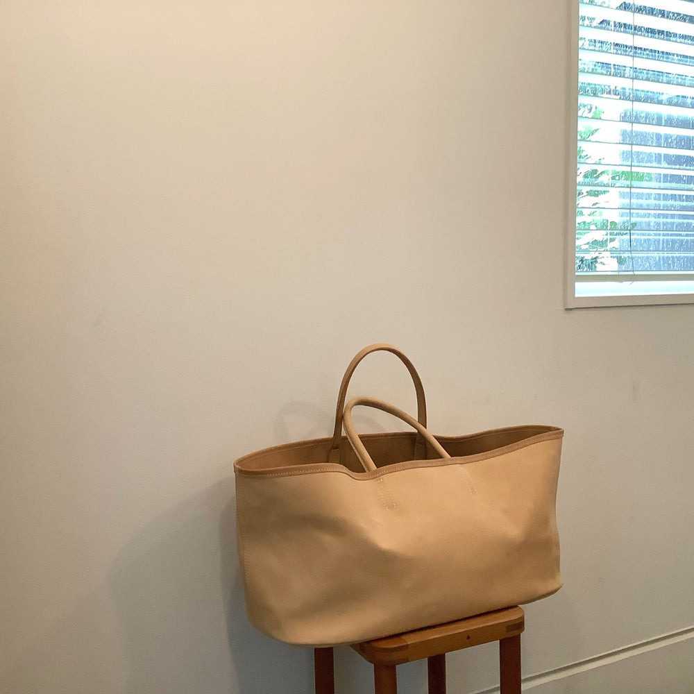 Leather oval basket bag