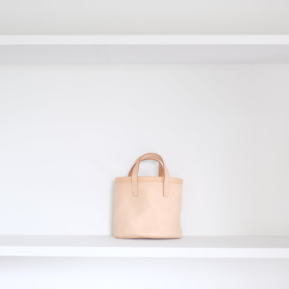 Leather round mini bag: short handles