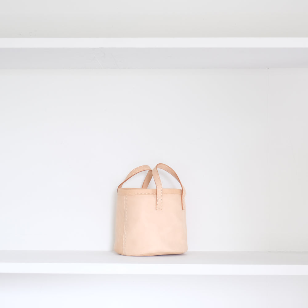 Leather round mini bag: short handles