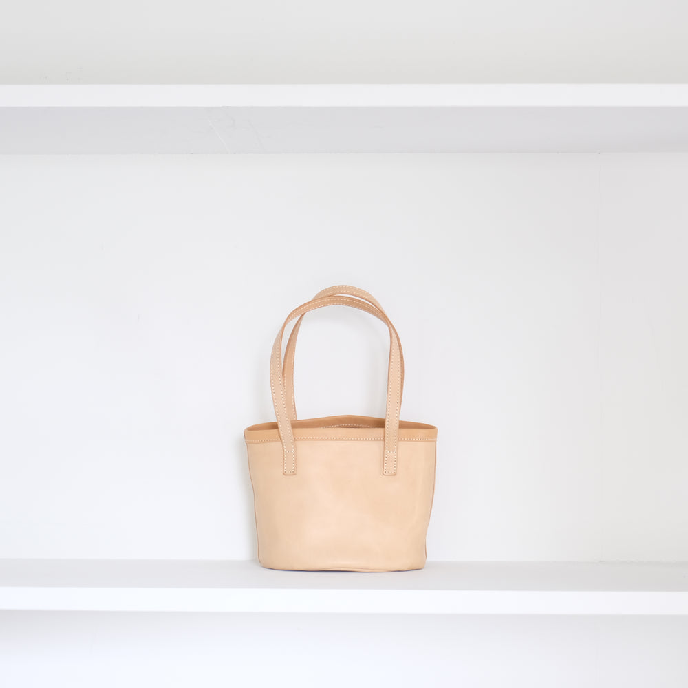 Leather round mini bag: long handles
